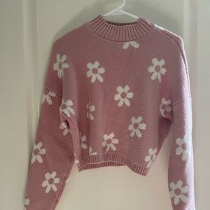 Hollister pink with white flowers sweater.